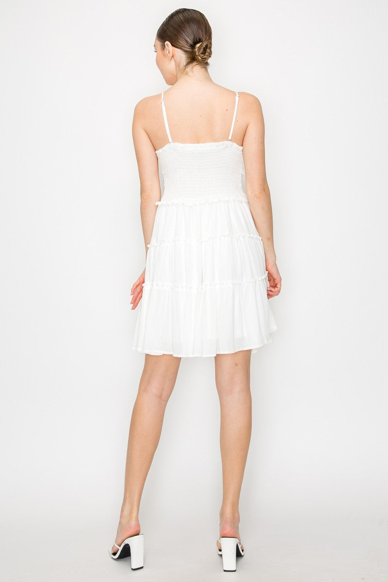 White scallop-sweetheart spaghetti-strap crochet-waist-panel button-front tiered chiffon mini dress - back view showing spaghetti straps and tiered chiffon skirt