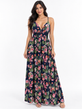 Navy tropical-floral spaghetti-strap deep-V crossback smocked-waist flowy maxi dress - front full-length white background view showing fine spaghetti straps, dramatically plunging deep-V neckline with gathered centre panel, smocked waistband, and enormous voluminous flowy maxi skirt in deep navy with bold pink lotus coral tulip and green tropical foliage print