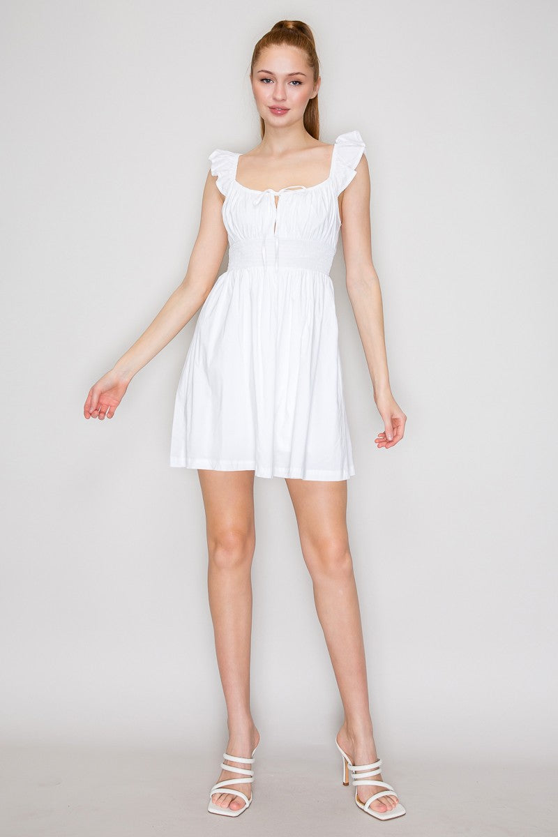 Mint green ruched-bodice ruffle-strap front-tie smocked-waist babydoll mini dress - front full view showing scoop neckline, tie bow, ruffle straps, and full skirt