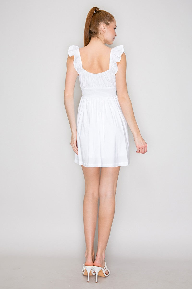 Mint green ruched-bodice ruffle-strap front-tie smocked-waist babydoll mini dress - back view showing open scoop back, ruffle straps, and smocked waistband