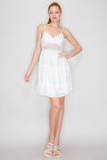 White sweetheart spaghetti-strap crochet-waist tiered babydoll mini dress - close-up detail of geometric crochet lace waist panel