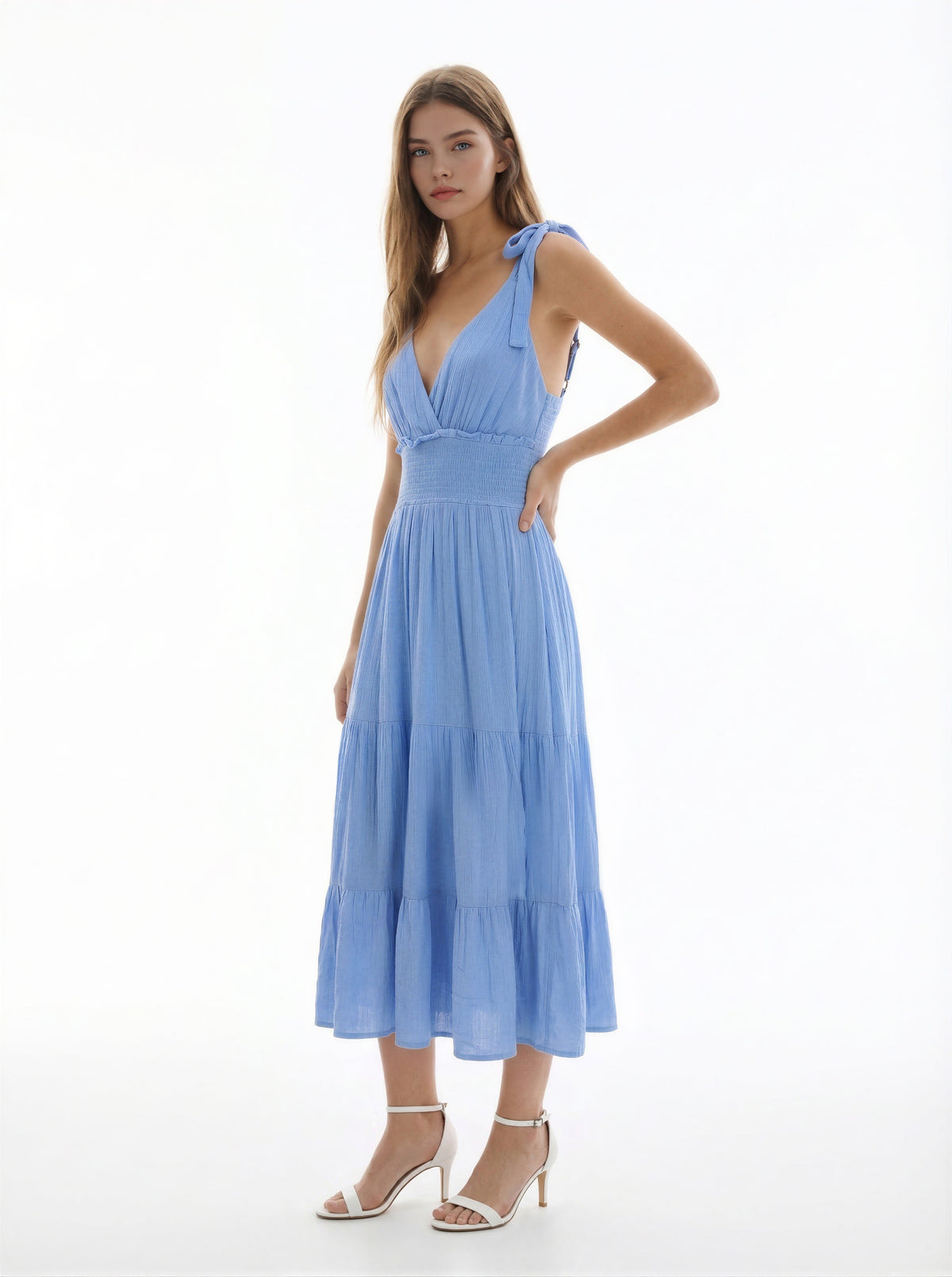 White V-neck tie-shoulder smocked-waist tiered midi dress - front full view showing clean V-neckline, wide tie-bow shoulder straps, fully smocked bodice, and full generously tiered midi skirt in crisp white