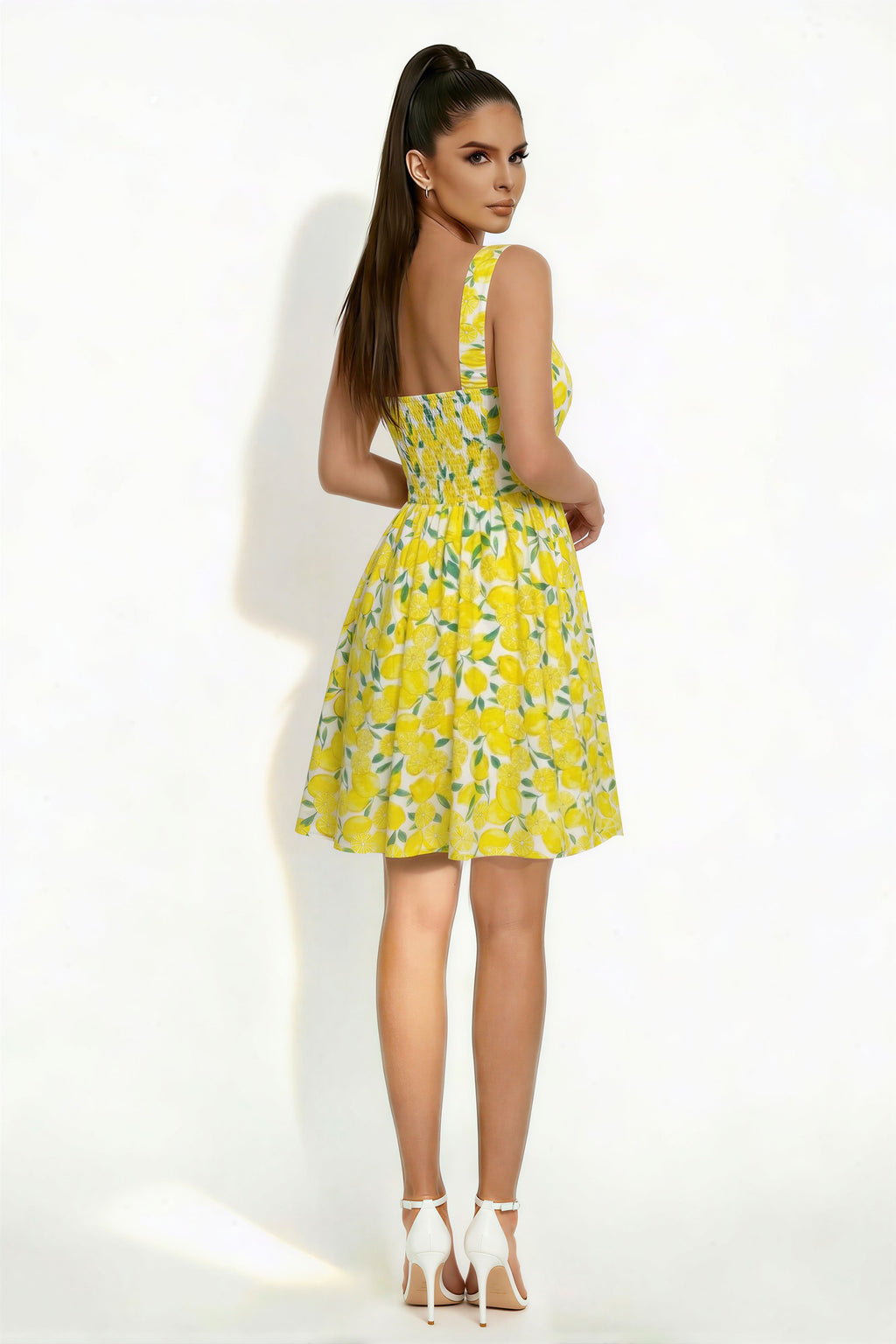 Lemon print wide-strap square-neck fitted-bodice open-back full-skirt skater mini dress - back view showing dramatic open back and full circle skirt