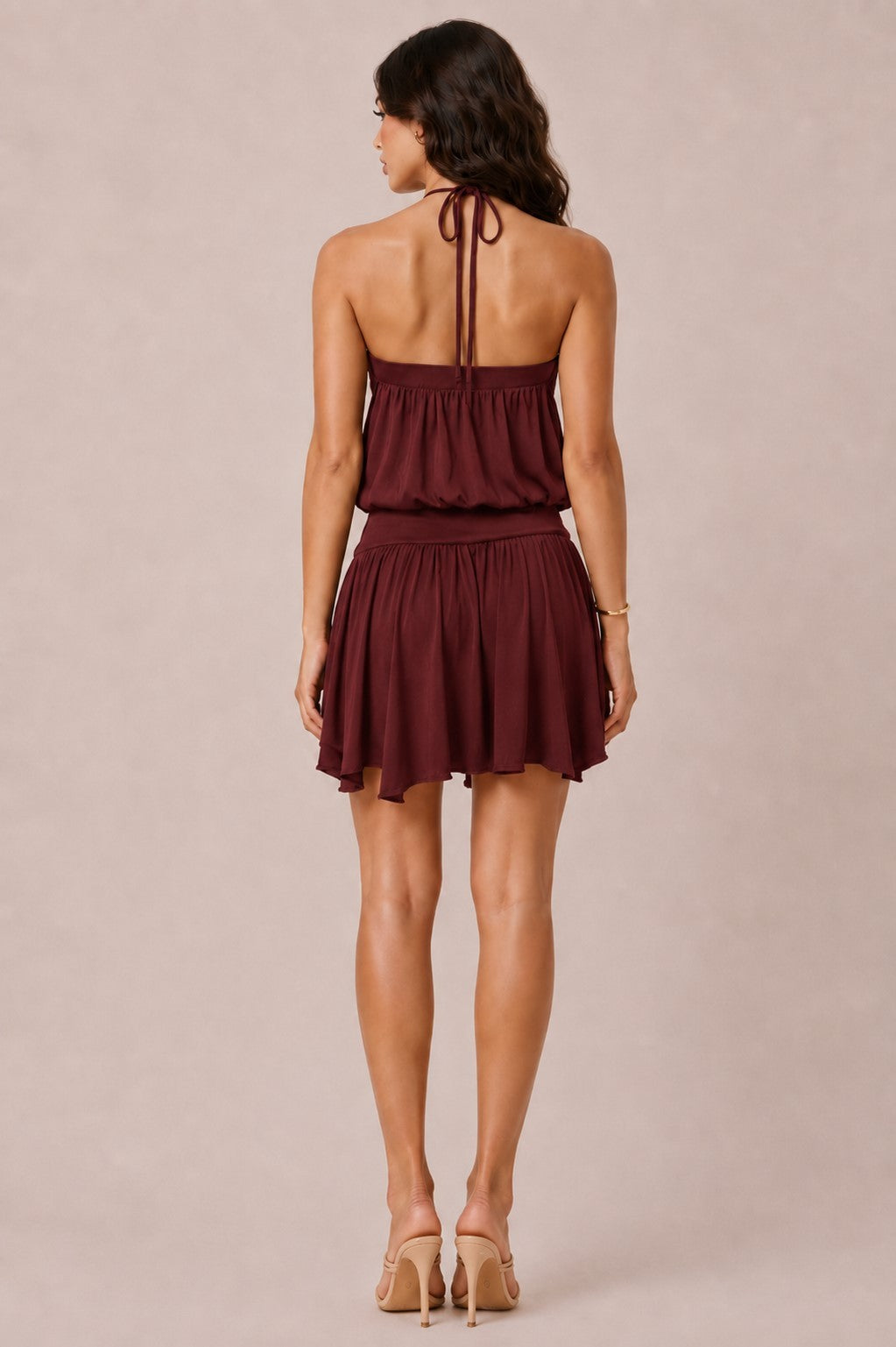 Burgundy grommet halter criss-cross tie-back blouson flowy mini dress - back view showing open back and tie