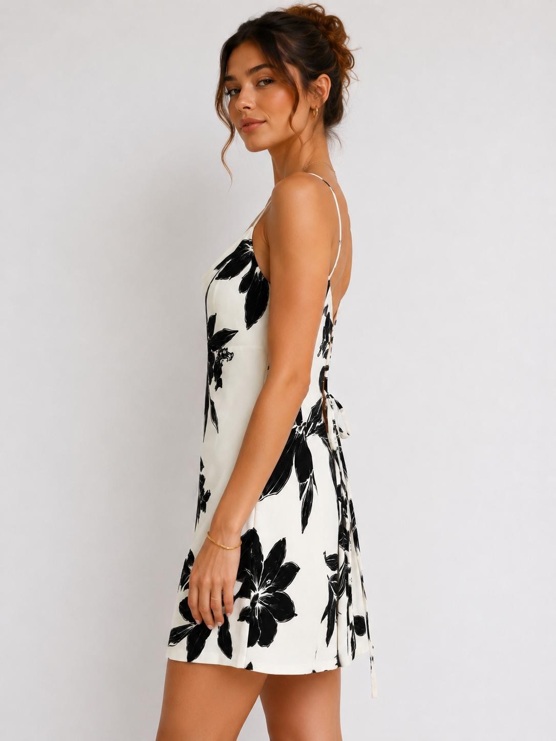 Black and white floral spaghetti strap cowl neck lace-up back mini dress - side view
