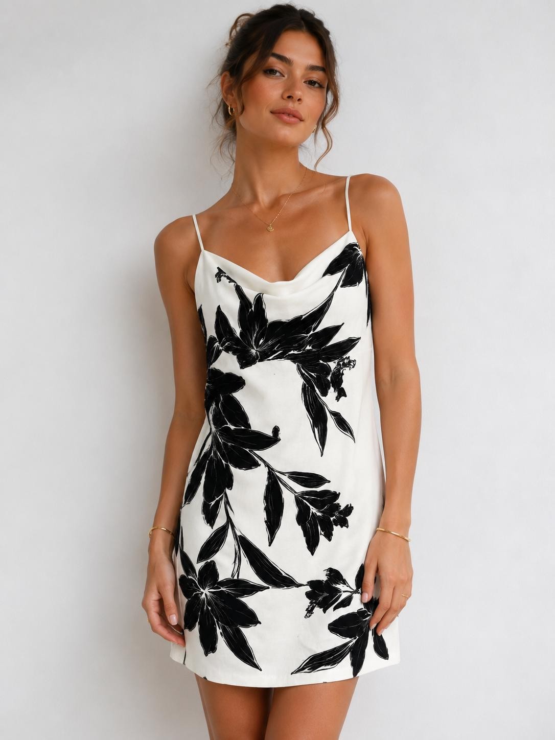 Black and white floral spaghetti strap cowl neck lace-up back mini dress - back lace-up detail view
