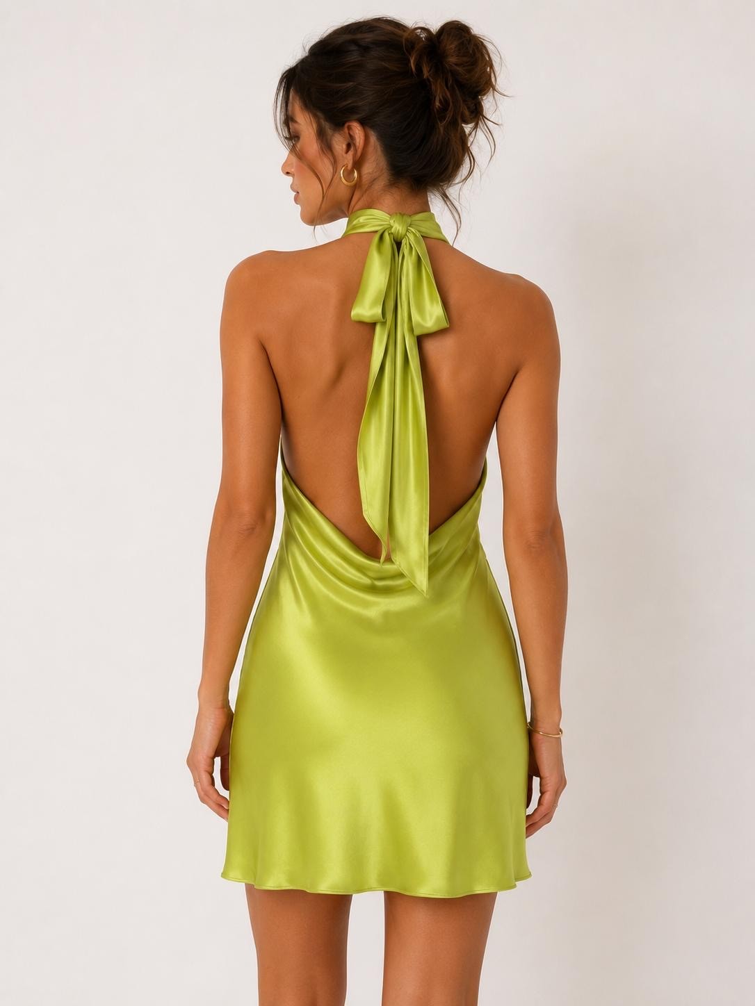 Chartreuse satin cowl neck halter tie-back open back mini dress - back view showing bow tie and open back