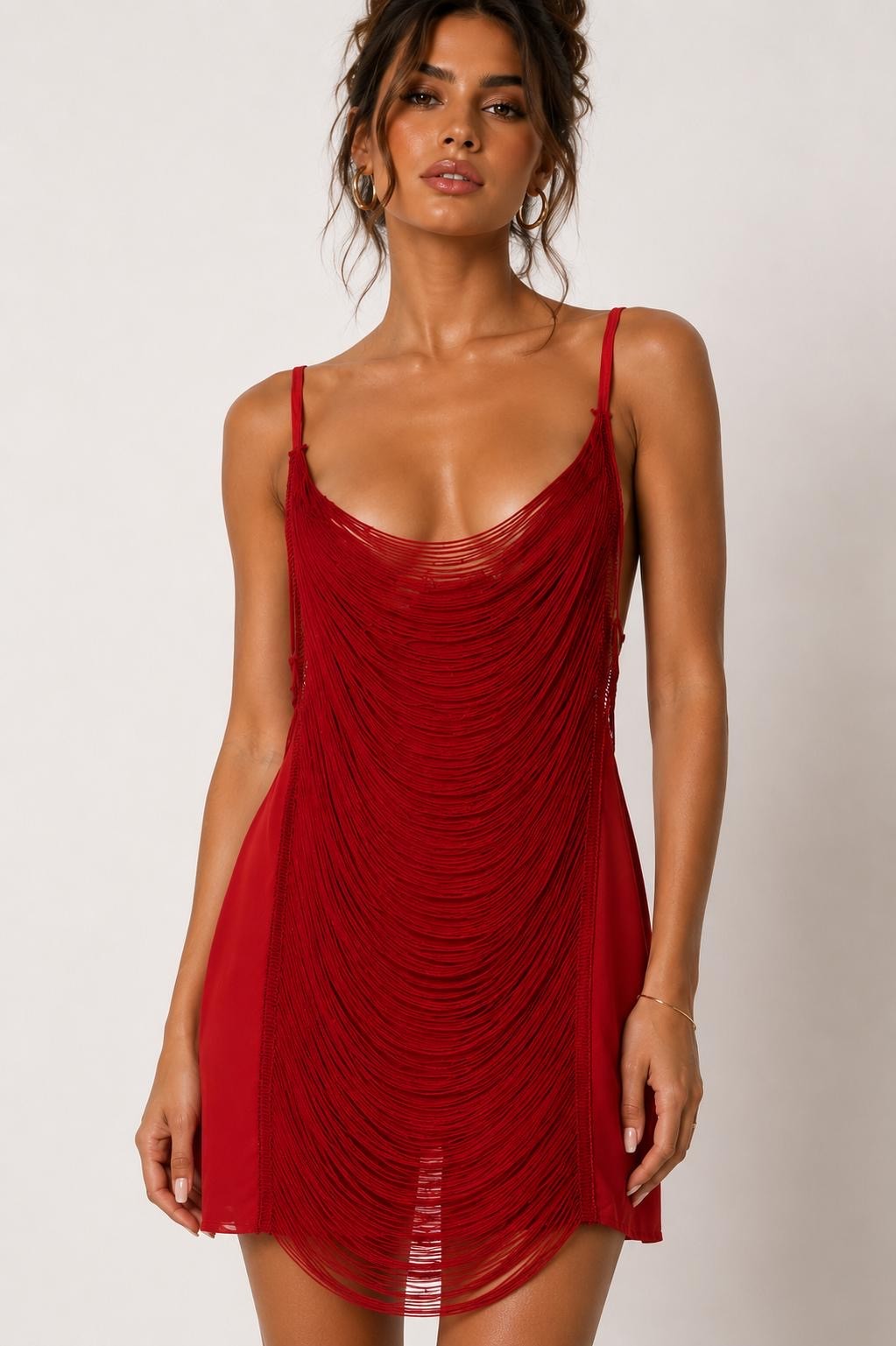 Deep red spaghetti-strap deep-V cowl-neck open-back distressed-knit slip mini dress - front close-up showing deep V cowl neckline drape and allover distressed ladder-knit texture