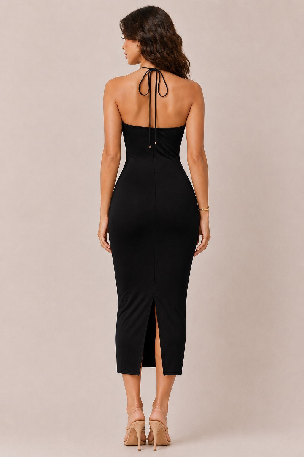 Black cowl-neck O-ring spaghetti-strap side-ruched bodycon midi dress - back full view showing halter neck tie at nape of neck, open back detail, smooth bodycon back silhouette, and centre back slit at midi hem in black