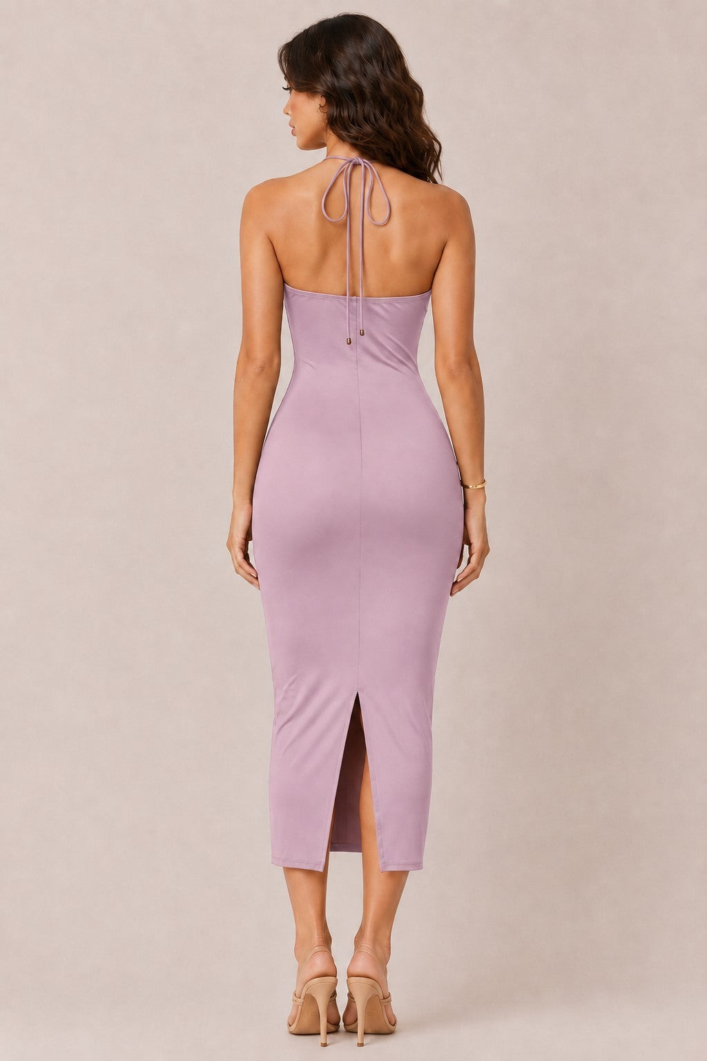 Dusty lilac cowl-neck O-ring spaghetti-strap side-ruched bodycon midi dress - side three-quarter view showing cowl neckline, gold O-ring strap detail, side ruching profile through waist and hip, smooth bodycon silhouette, and midi length in dusty lilac