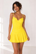 Hot pink ruched V-neck spaghetti-strap open-back pleated-skirt lettuce-hem mini dress - side view showing ruched bodice and pleated skirt