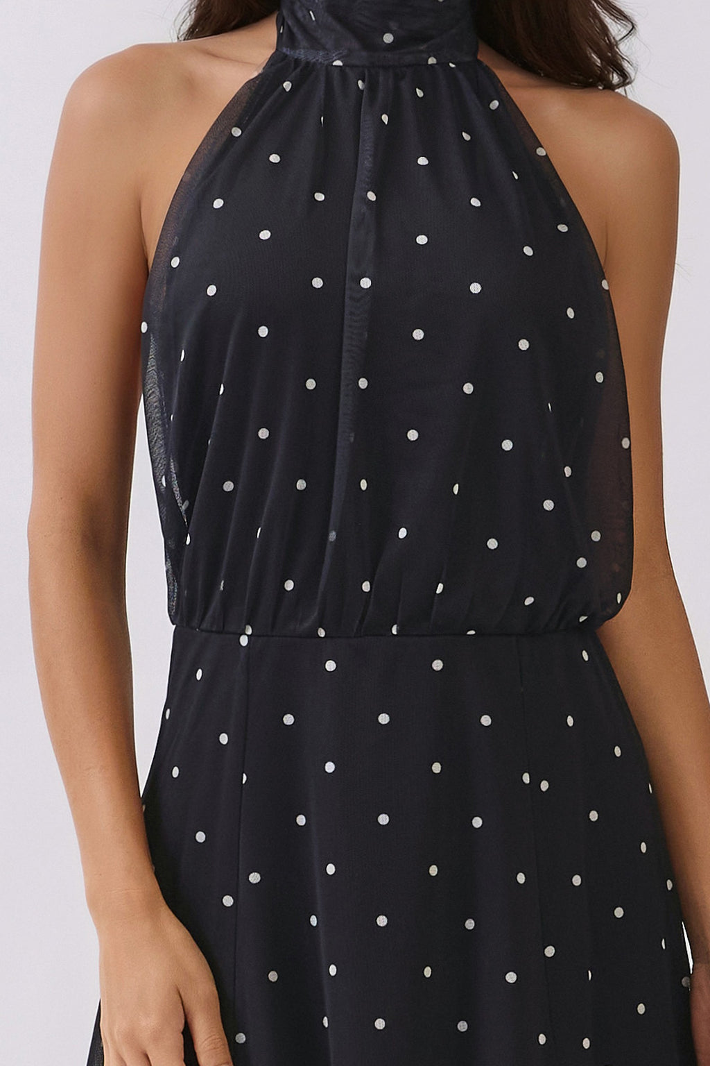 Navy polka dot halter high-neck open back blouson mini dress - detail close-up