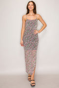 Ditsy floral mesh spaghetti-strap square-neck allover-ruched open-back lace-up side-slit bodycon maxi dress - front full view showing square neckline, gold-detail spaghetti straps, dense allover ruching, and maxi length in black ditsy floral