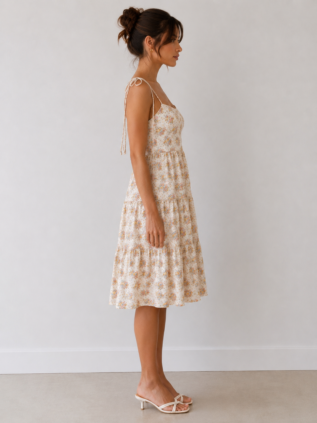 Ditsy floral square-neck tie-shoulder tiered midi dress - back view showing open back and tie bow shoulder detail