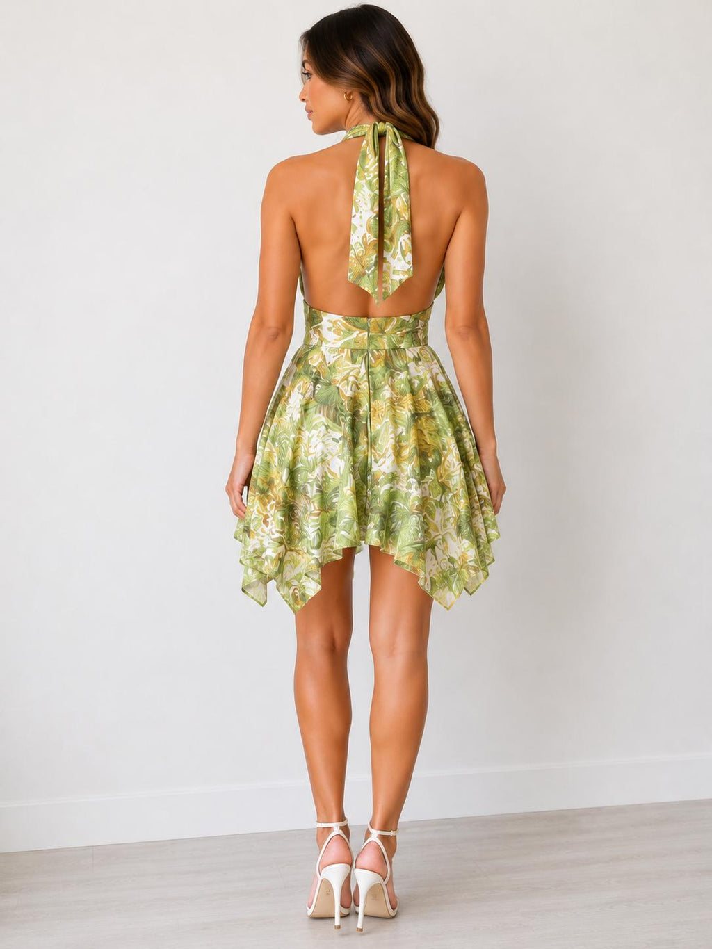 Cobalt blue tropical floral halter deep-V wrap tie-waist open-back handkerchief hem mini dress - back trailing tie view