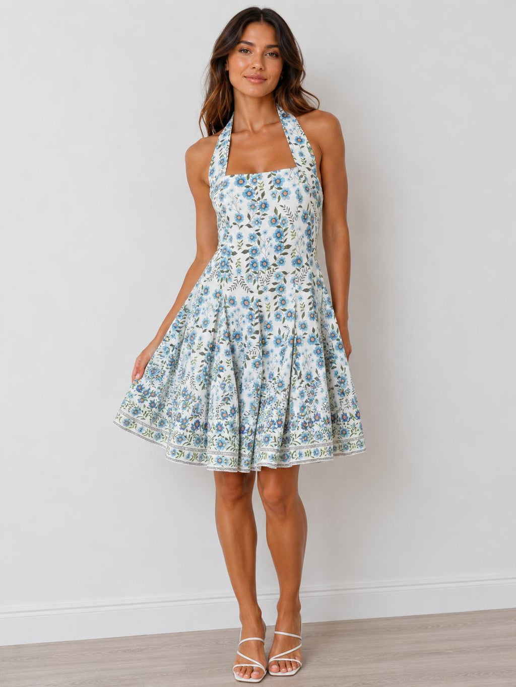 Blue botanical halter square-neck smocked waist fit-and-flare border print mini dress - front full view showing square neckline and border hem