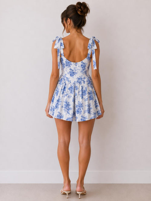 Blue toile floral scoop-neck tie-shoulder open-back fit-and-flare mini dress - front full view showing scoop neckline and tie shoulder bows