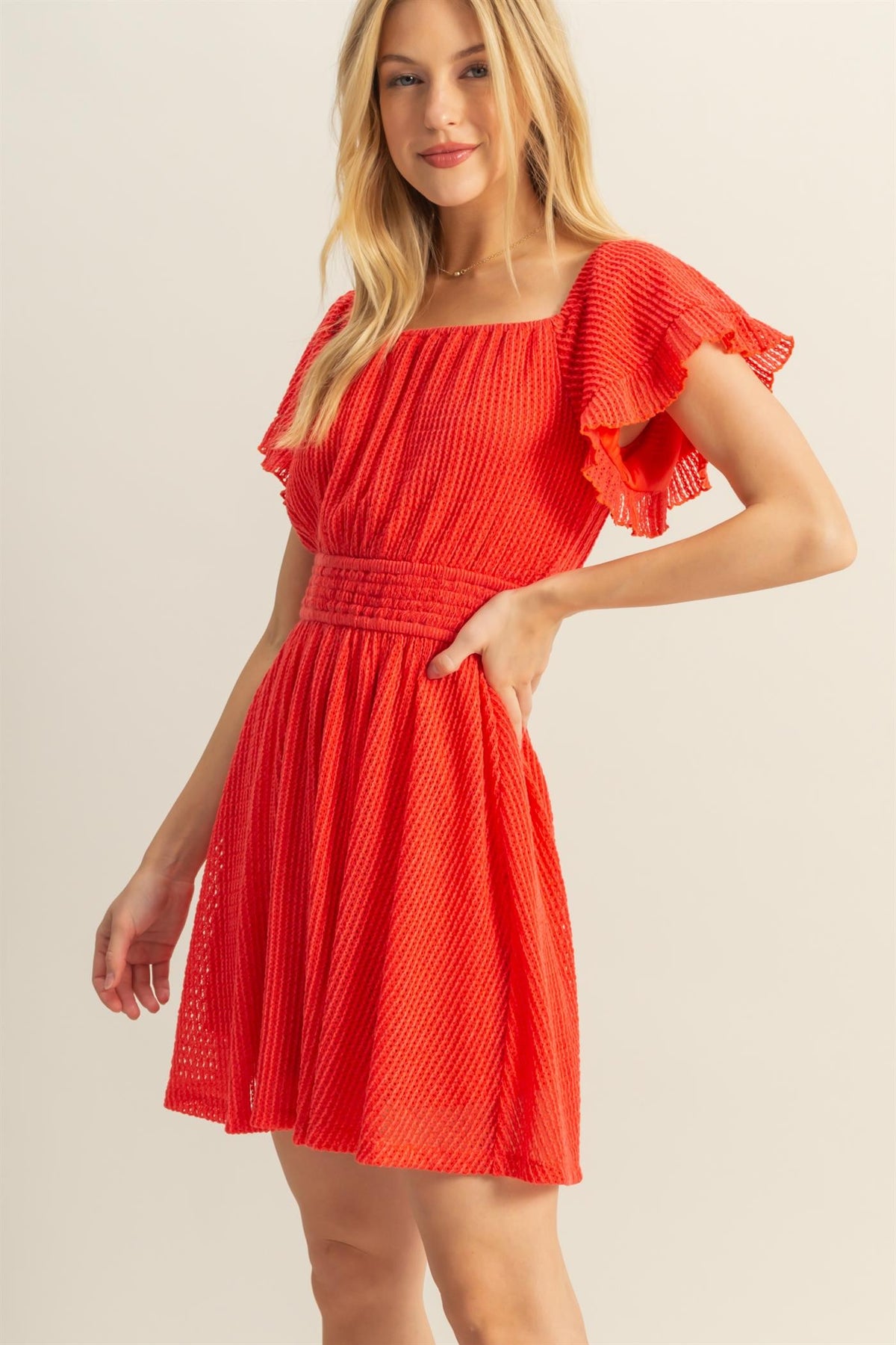 Red textured off-shoulder ruffle-sleeve smocked-waist fit-and-flare mini dress - front full-length view showing complete silhouette