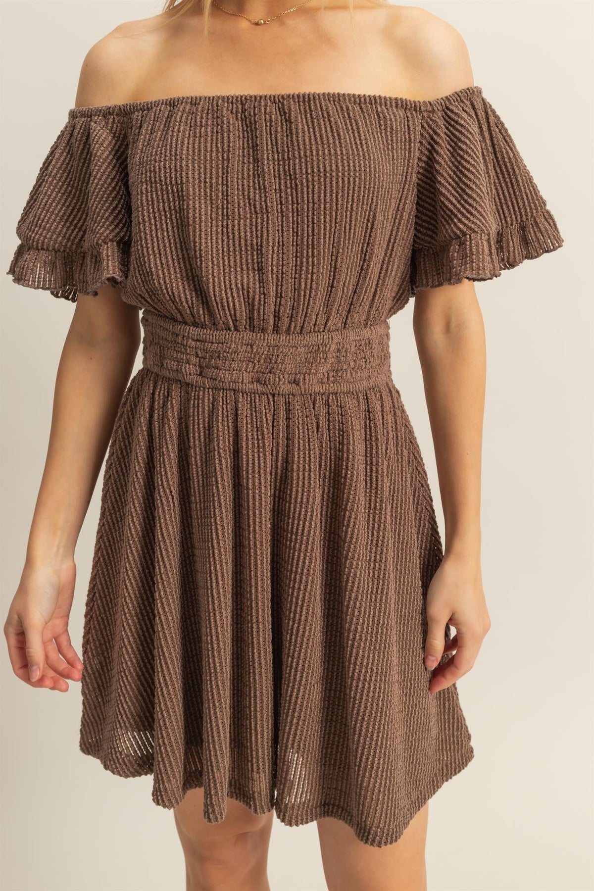 Mocha brown textured off-shoulder ruffle-sleeve smocked-waist fit-and-flare mini dress - side view showing off-shoulder ruffle and smocked waist