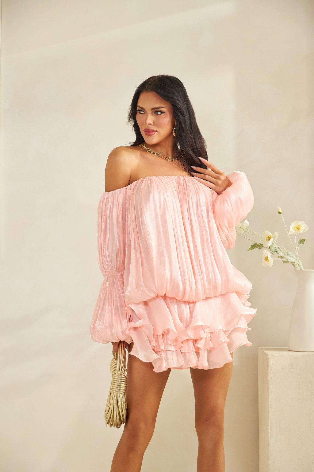 Blush pink off-shoulder pleated balloon sleeve double ruffle mini dress - front three quarter view
