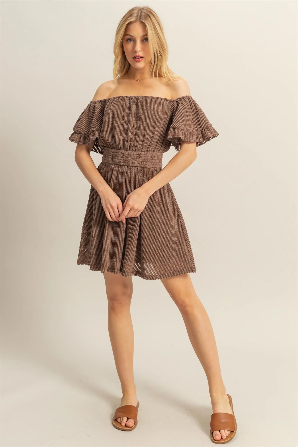 Brown off-shoulder ruffle sleeve smocked waist mini dress - front view