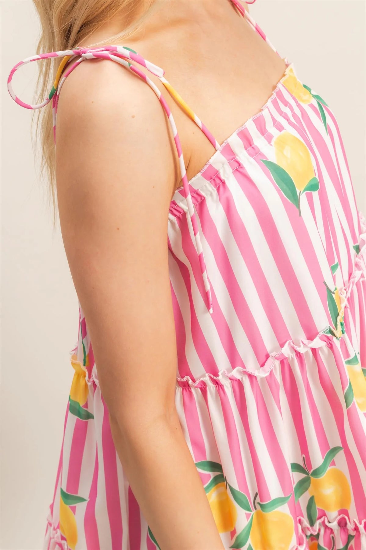 Pink lemon print striped tiered babydoll mini dress - side detail