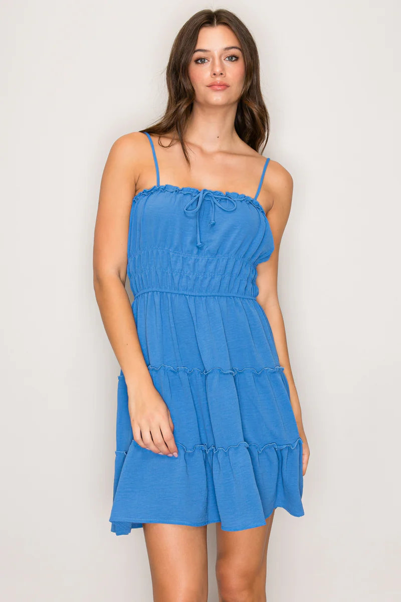 Blue tie-front tiered ruffle mini dress - front view